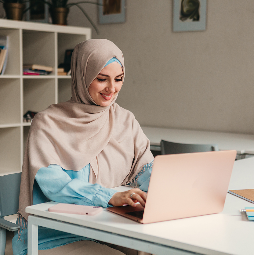 Woman typing on a keyboard